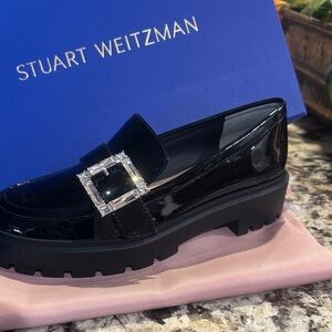 Stuart Weitzman Glossy Black Loafers with Buckle